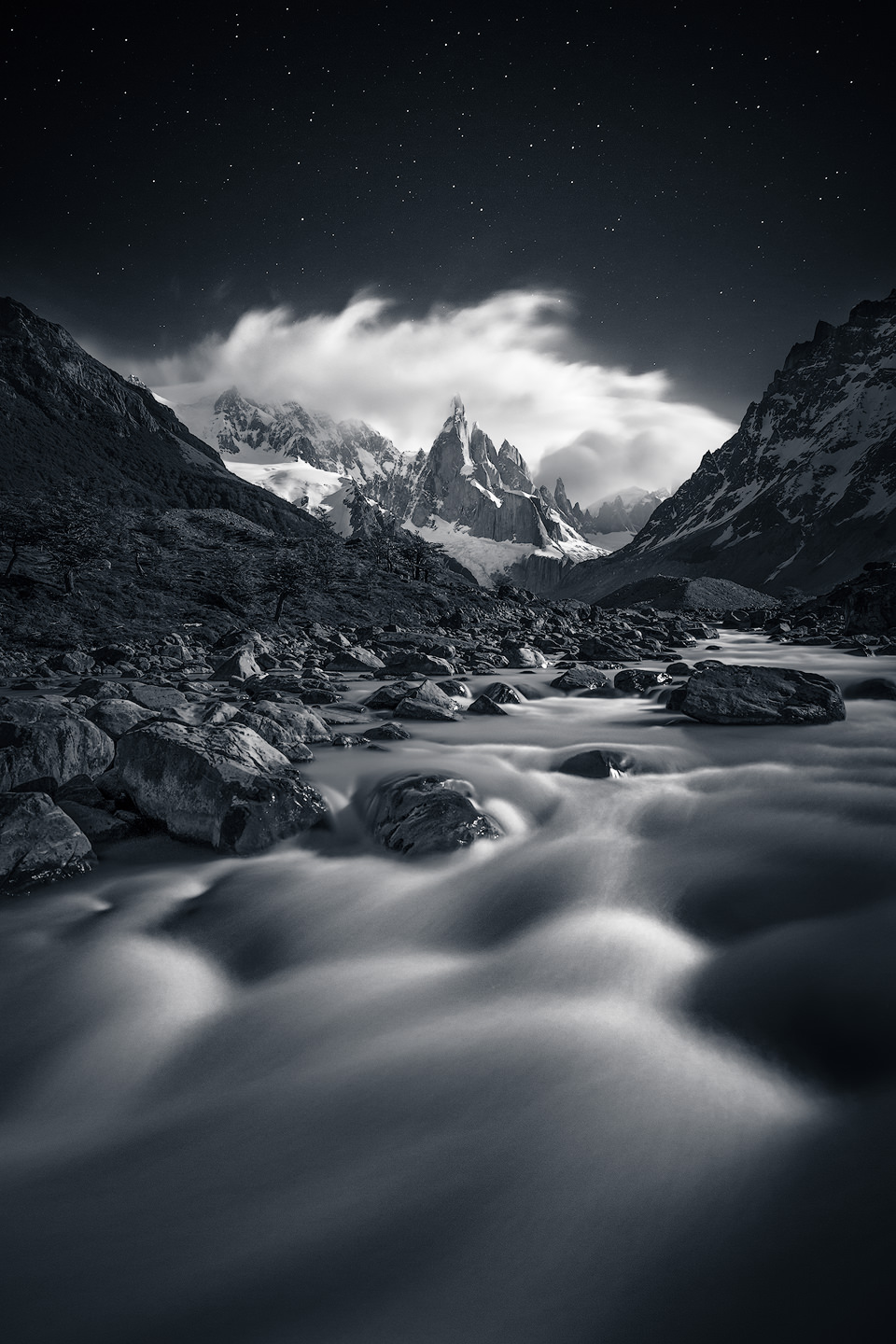 Stars and moonlight above Cerro Torre, Patagonia.
